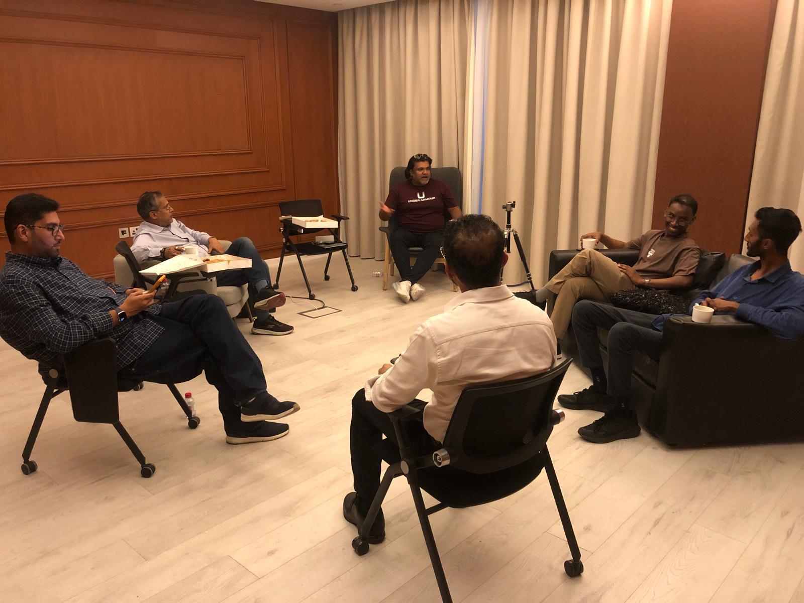 AI Mavericks members in a small-group discussion