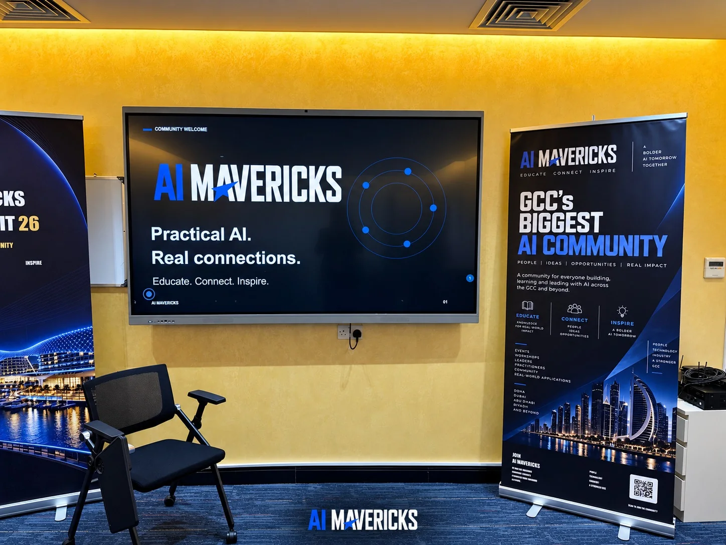 AI Mavericks welcome screen and GCC community banners at IBW Center of Excellence